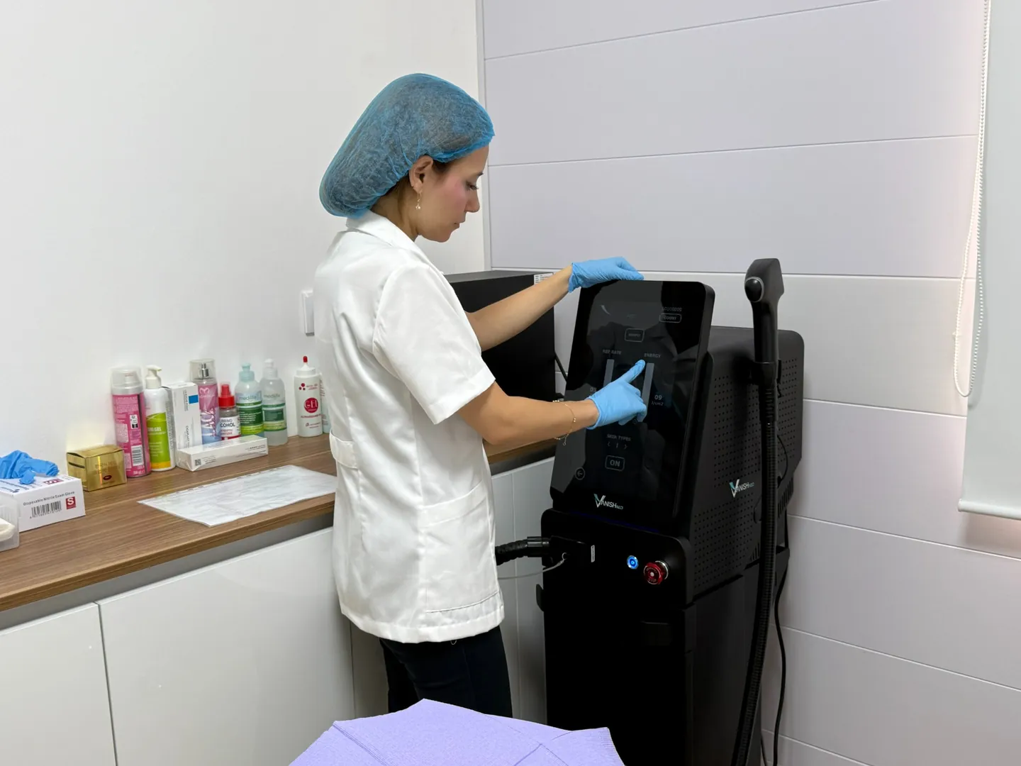 Rita preparing the laser equipment in her Baabda clinic